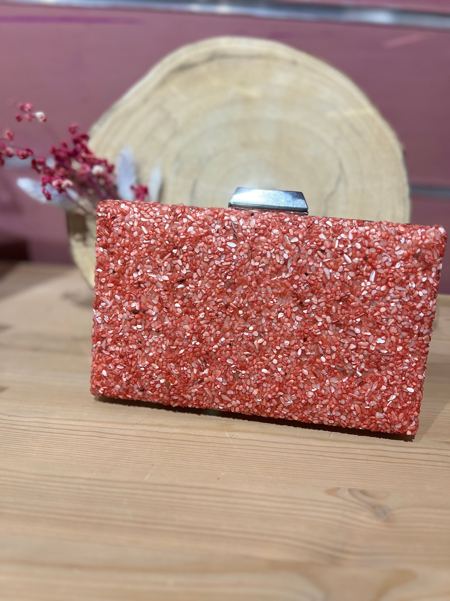 Clutch piedra coral.