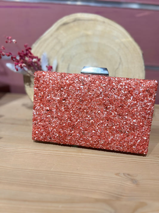 Clutch piedra coral.